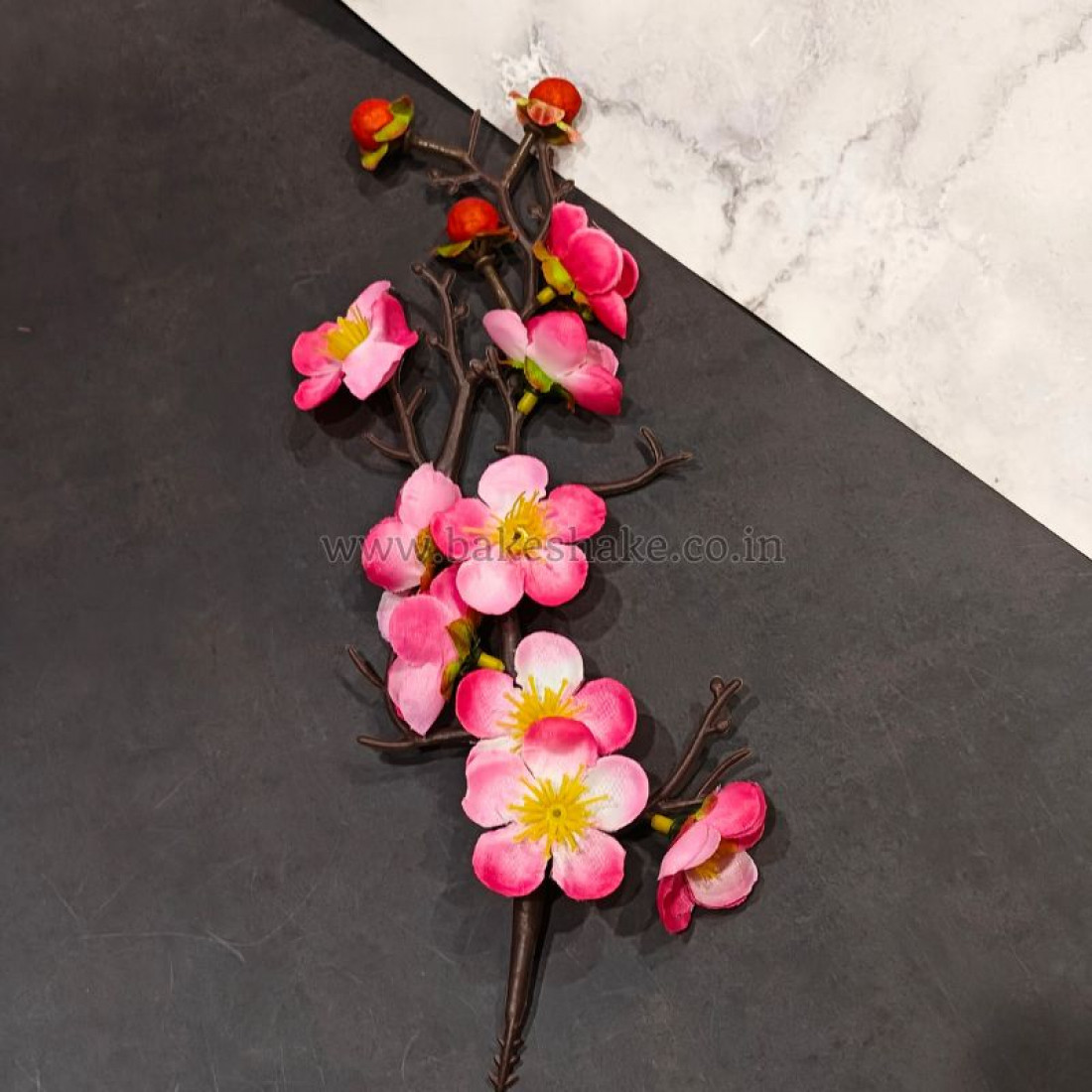 artificial-plum-blossom-flower-branch-stick-pink-1100x1100-1.jpg